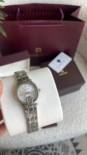 ساعة اقنر نسائيه فضي شامل ملحقاته