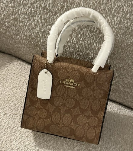 شنطة براند COACH