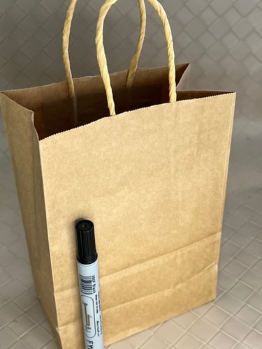 اكياس هدايا صغيره ورقي الوان سادة