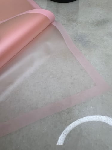 ورق تغليف بلاستك شفاف مع ايطار لون