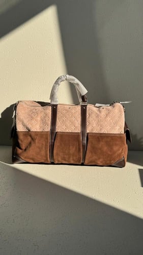 حقيبة سفر بحمالات يد لويس فيتون Keepall Bandoulièr...