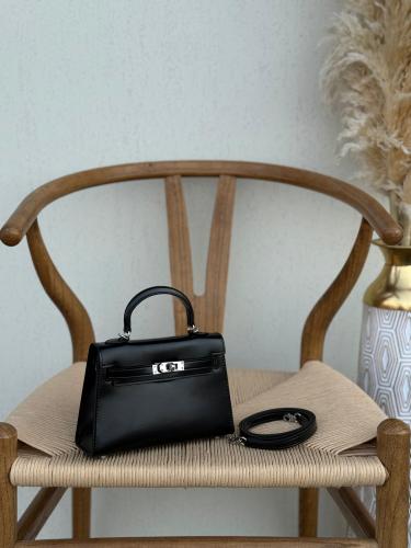 شنطة ميني ايرميس كيلي 19 سم جلد ناعم أسود معدن فضي