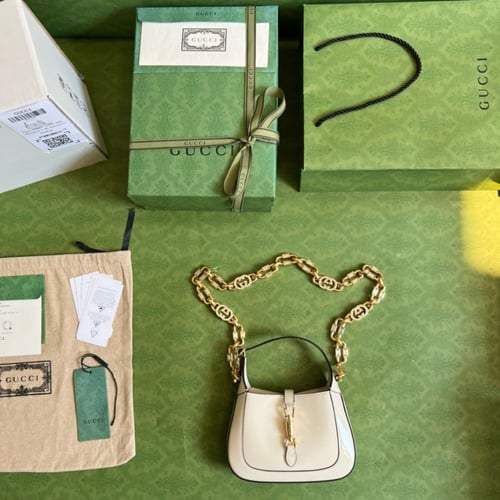 قوتشي ميني ١٩ سم لمعه