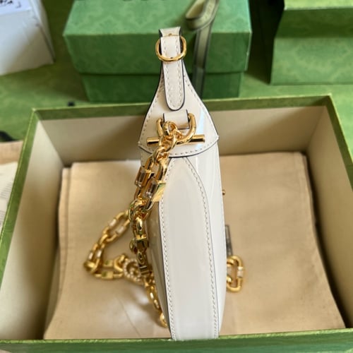 قوتشي ميني ١٩ سم لمعه