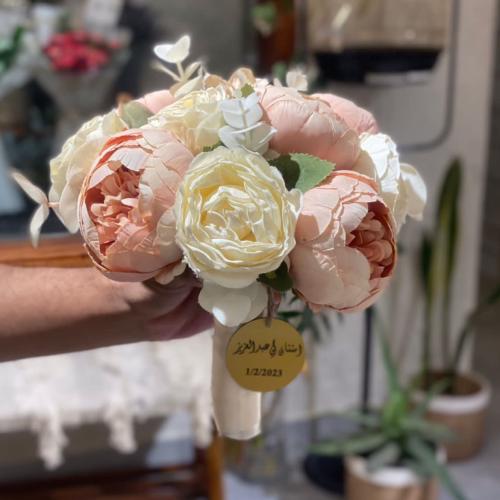 مسكة عروس صناعي