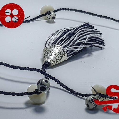 تركيبات عظم من ازراري لاناقة الثوب السعودي