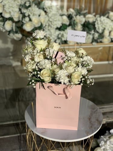 تنسيق مجموعه هدايا على كيس توس ( tous )