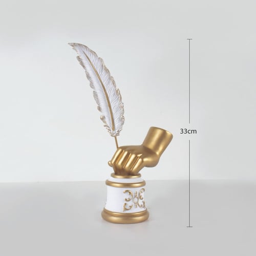 تمثال الريشة الذهبية