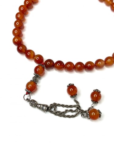 سبحه عقيق بني