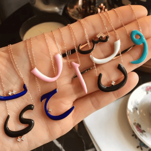 سلسال حرف أ روز قولد : ابيض