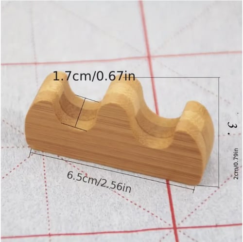 مسند خشبي لأقلام الخط