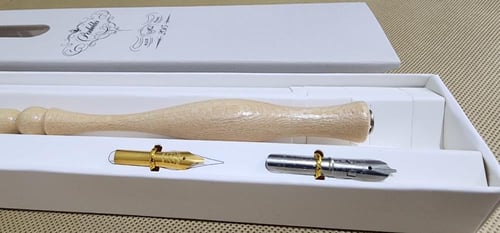 سلاية أزمرويد فضية على مقبض خشبي فاخر osmiroid