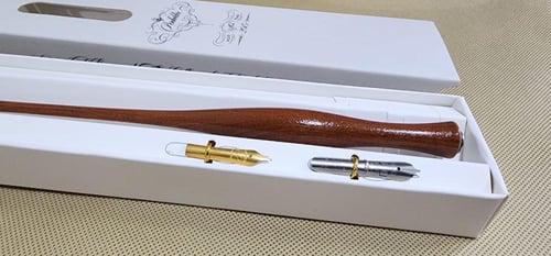 سلاية أزمرويد فضية على مقبض خشبي فاخر osmiroid