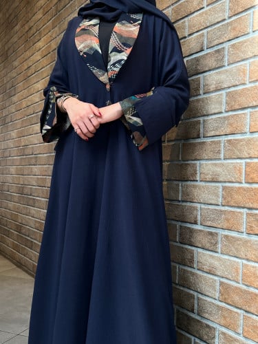 عباية بقماش الحرير المغسول كحلي ومشجر قصه نص كلوش