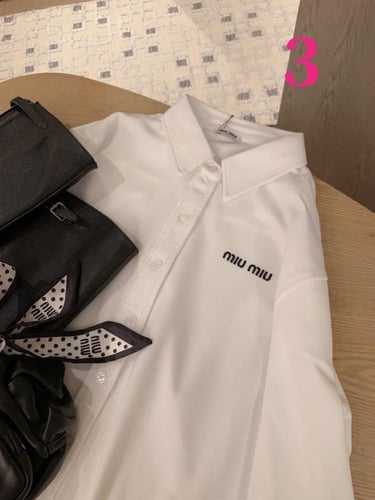 قميص miumiu