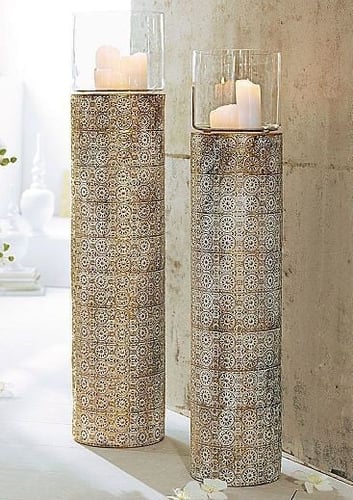 طقم من الشمعدان المعدني المنقوش وذو دورين ،،