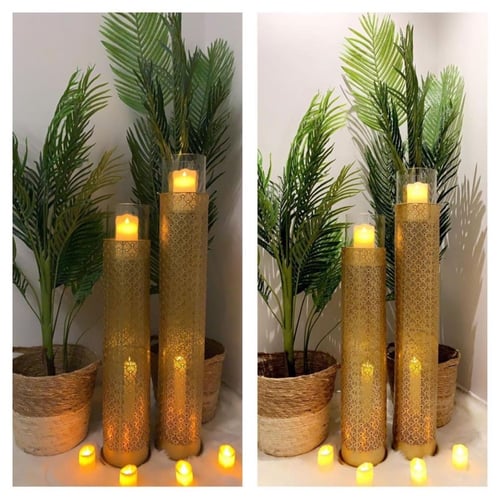 طقم من الشمعدان المعدني المنقوش وذو دورين ،،