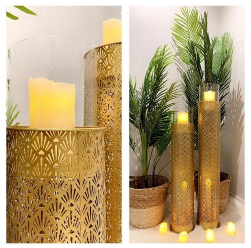 طقم من الشمعدان المعدني المنقوش وذو دورين ،،