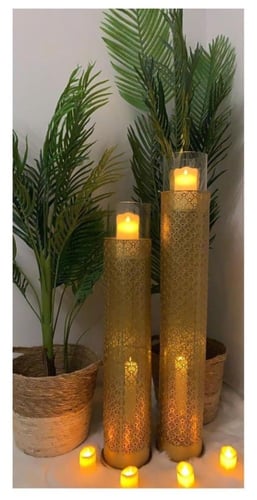 طقم من الشمعدان المعدني المنقوش وذو دورين ،،