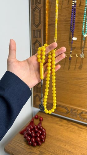 مسباح بكلايت أصفر معرق