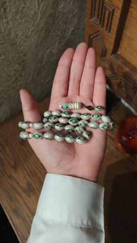 عاج مطعم فضة مع زمرد وفيروز