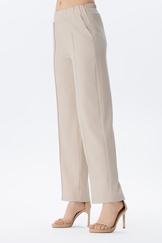 بنطلون بيج واسع بخصر مطاطي