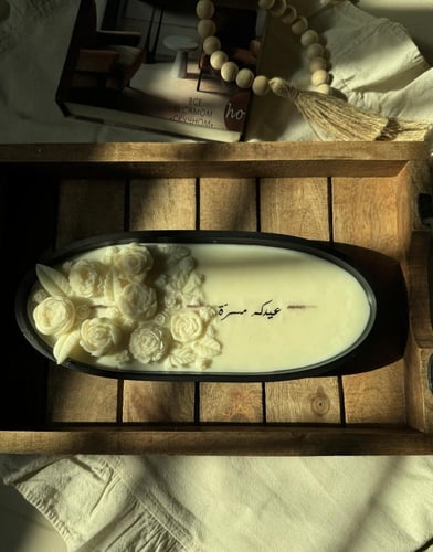 شمعة بيضاوي مع عبارة