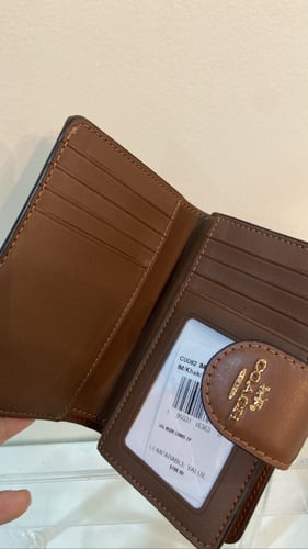 محفظة coach