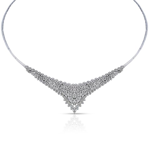 طقم ذهب ابيض - عيار 18- 30.330 جرام تقريباً