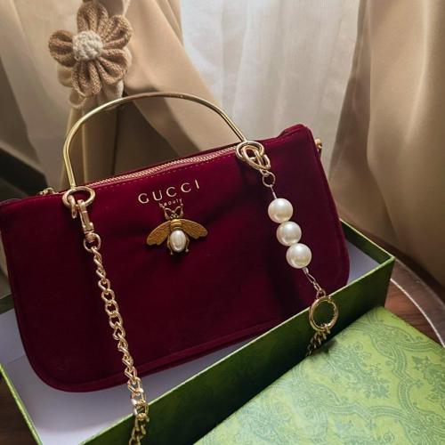 شنطة قوتشي لون عودي