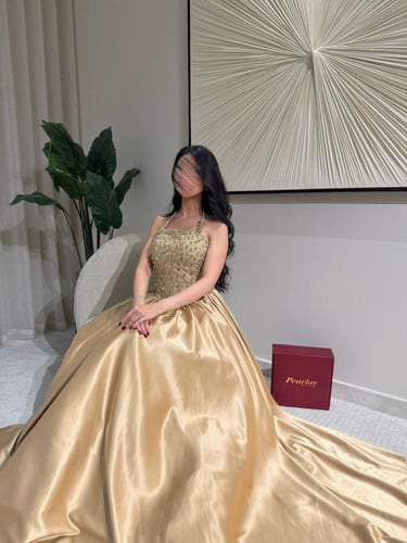 فستان لوميير الذهبي