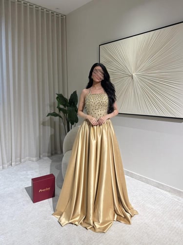 فستان لوميير الذهبي