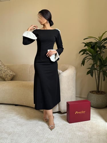 فستان اسود وابيض مع لولو