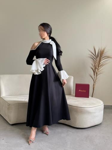 فستان اسود فيونكه ابيض