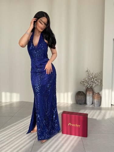 فستان وهج اللؤلؤ الأزرق
