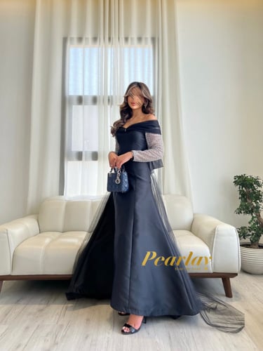 فستان سهره اسود باكمام شفافه فضي