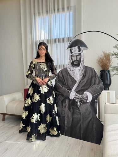 فستان التأسيس اسود مذهب