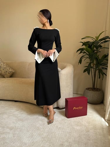 فستان اسود وابيض مع لولو