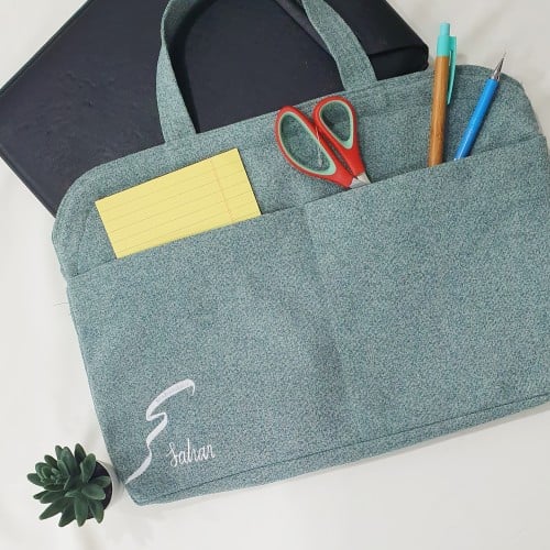 شنطة لابتوب تصميم الجيوب المتصلة