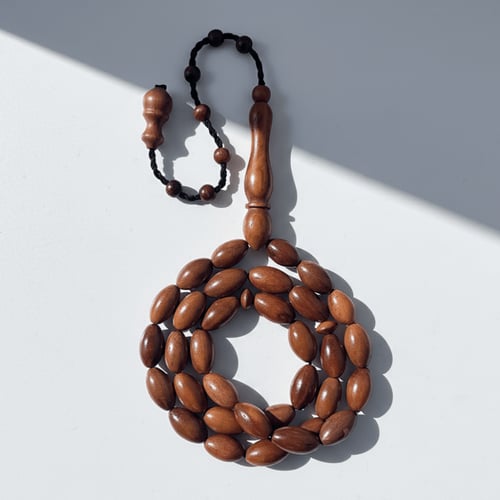 سبحة خشب كوك طبيعي - 7 ملي 33 خرزة نواعم