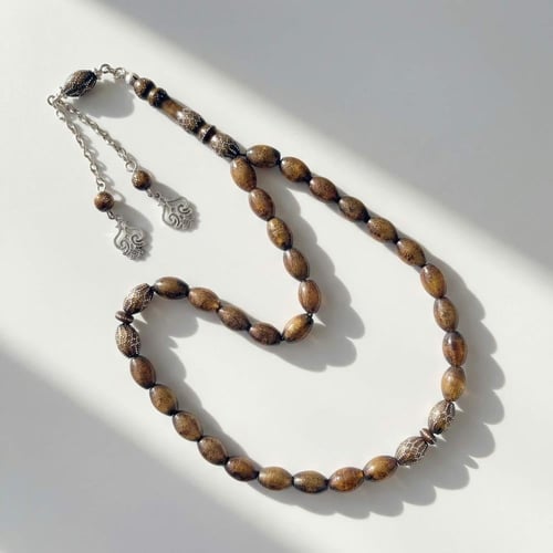 سبحة اليسر الذهبية النادرة مطعمة بالفضة - قطعة فني...