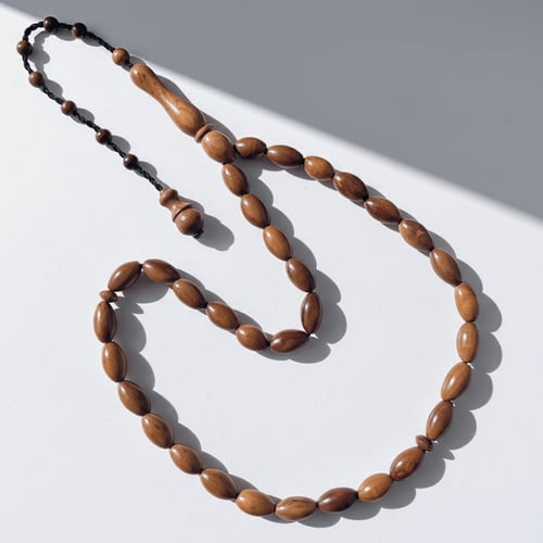 سبحة خشب كوك طبيعي - 7 ملي 33 خرزة نواعم