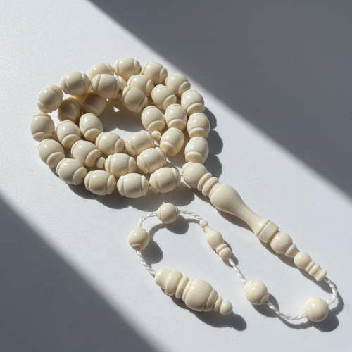 سبحة عاج ناب الفيل طبيعي - 33 خرزة 10 ملي