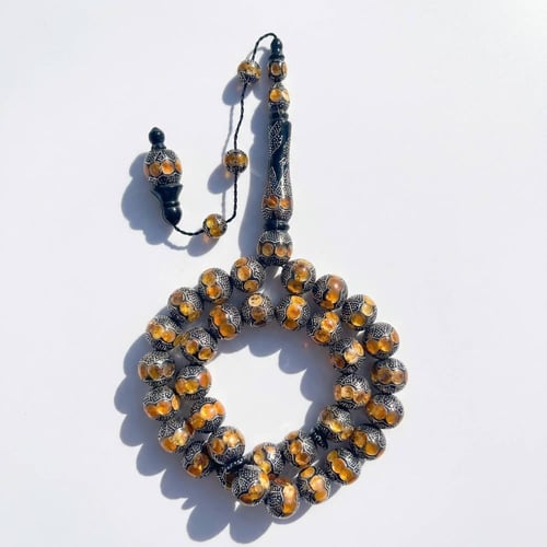 سبحة يسر مطعم كهرمان طبيعي و فضة عيار 1000 - 16 مل...