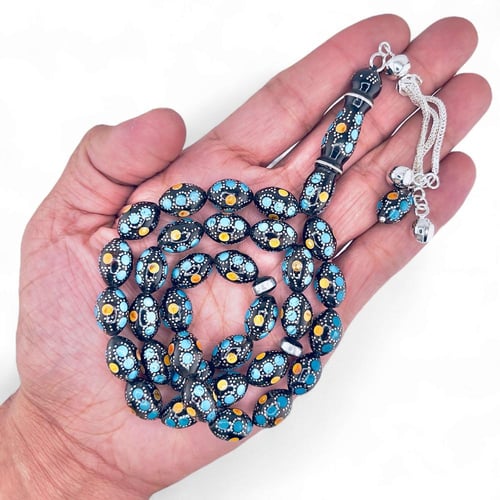 سبحة يسر المرجان الأسود مطعمة بفضة عيار 925 وكهرما...