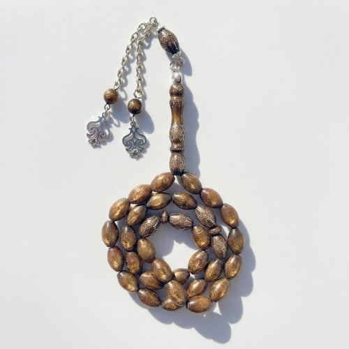 سبحة اليسر الذهبية النادرة مطعمة بالفضة - قطعة فني...