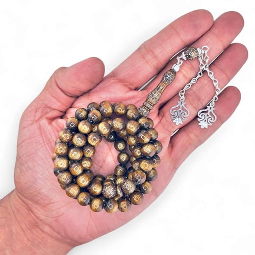 سبحة اليسر الذهبية النادرة مطعمة بالفضة 8 ملي - قط...