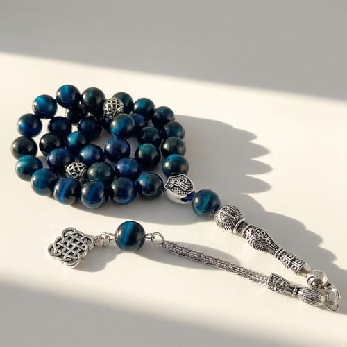 سبحة حجر عين النمر الكريم باللون الازرق