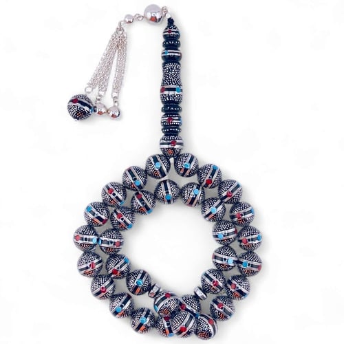 سبحة كوك و الشاهد يسر طبيعي مطعمة بالفضه ولون الفي...