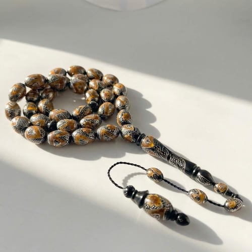 سبحة يسر مطعم كهرمان طبيعي و فضة عيار 1000 - 12 مل...